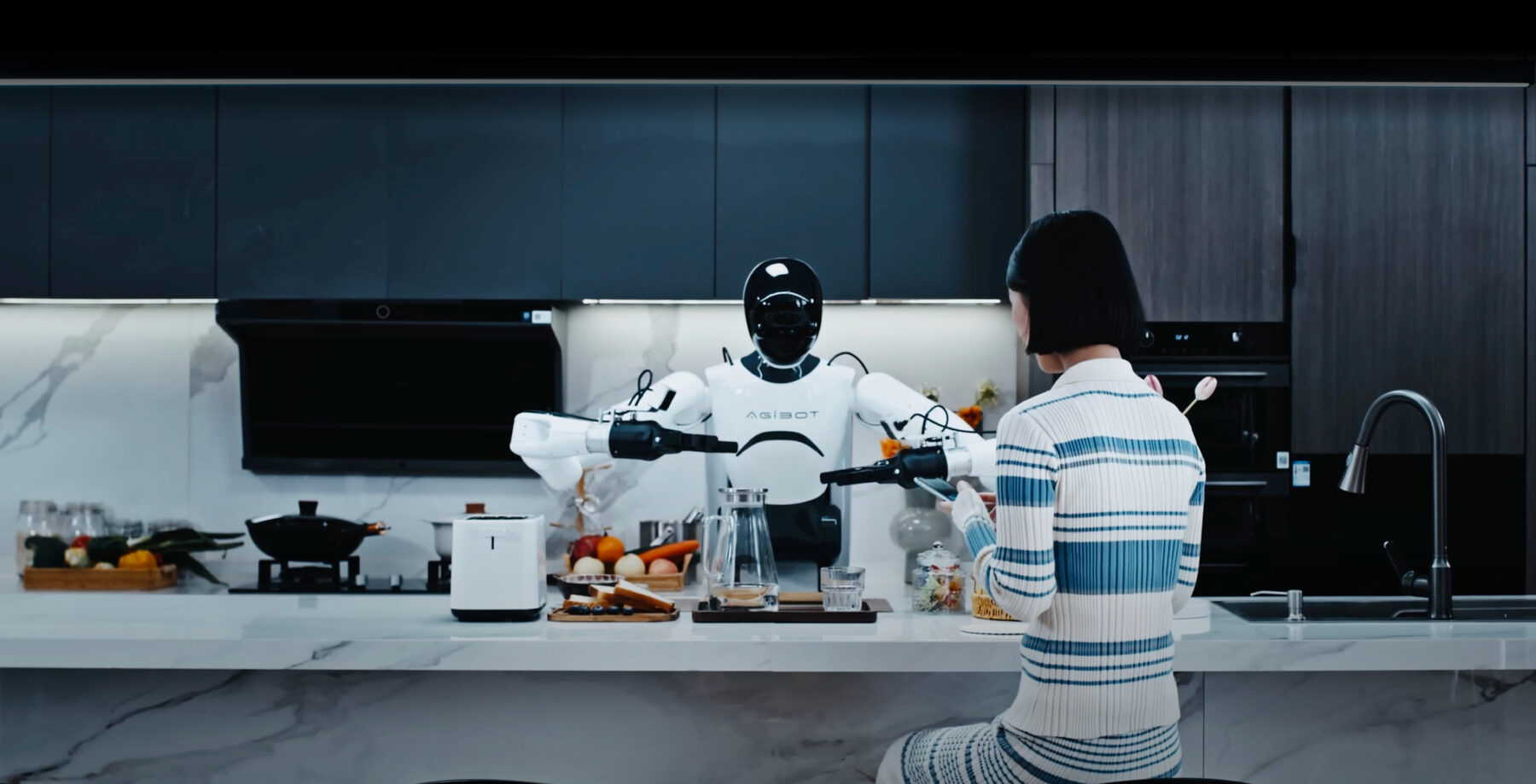 Humanoid robot in a home kitchen